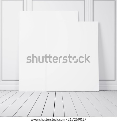 White interior with wood floor and blank posters