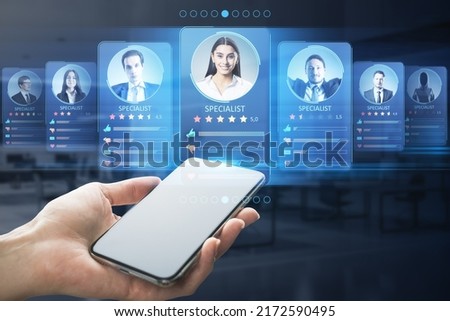 Hiring employee and human resources concept with modern smartphone projected virtual personal cards for online specialists and professional marketplace