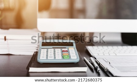 Nobody, Office supply on desk table with analysis chart, computer, notebook, pen,calculator on desk, Business concept.