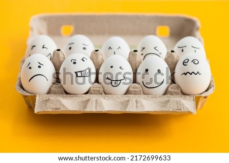 Set funny eggs on yellow background. The main symbol of the Happy Easter holiday. Easter eggs funny characters for greeting card banner poster.