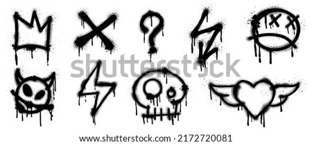 Set of black graffiti spray pattern. Collection of symbols, heart, crown, thunder, devil, skull, arrow with spray texture. Elements on white background for banner, decoration, street art and ads. Royalty-Free Stock Photo #2172720081