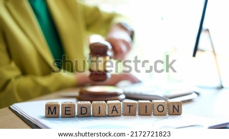 Text mediation on cubes in dispute resolution litigation. Procedure for considering family conflict concept Royalty-Free Stock Photo #2172721823
