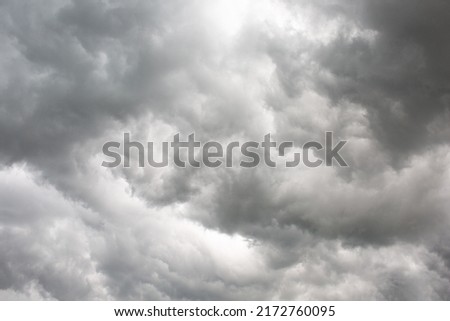 Picture dramatic clouds. Portrait size.