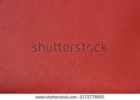Red natural saffiano grainy leather textured background. Royalty-Free Stock Photo #2172778005
