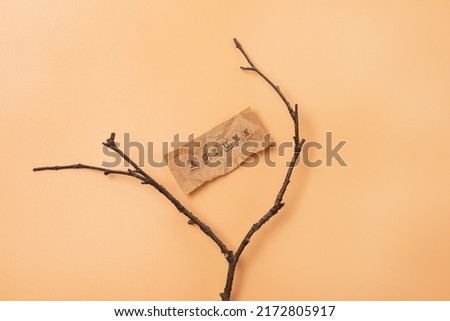 Autumn - Text on Craft Paper a Tree Branch Against the Background Yellow Background Abstract Autumn Background Horizontal