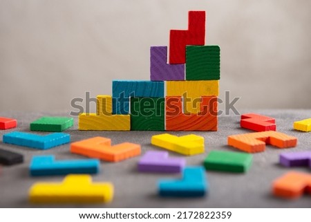 Creative idea solution - business concept, jigsaw puzzle close up. Leadership and teamwork strategy success. Royalty-Free Stock Photo #2172822359