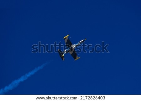 Action photos of a jet during a airshow