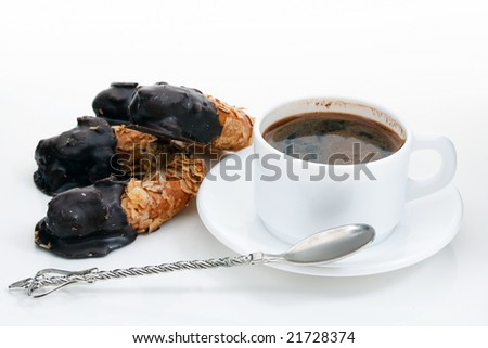 Cup of coffee with chocolate pastry