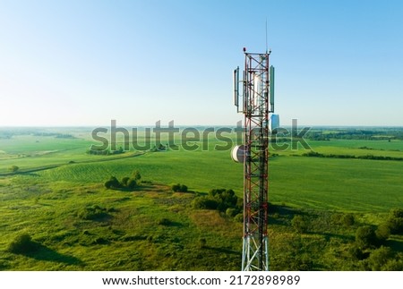Mobile Tower installation. Cell site and Telecom Base Station. 5G internet online generation. Health Hazards Caused By Mobile Tower Radiation. Telecommunications and Wireless network. Wifi antenna. Royalty-Free Stock Photo #2172898989