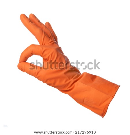 Hand with orange rubber glove shows ok sign isolated on white background