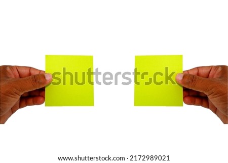 yellow card showing by two hands notes reading by hands with white background