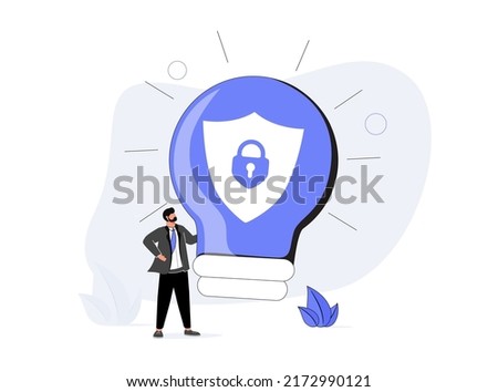 Intellectual property, patented protection, copyright reserved or product trademark that cannot copy concept, businessman owner standing with light bulb idea locked with padlock for patents. Royalty-Free Stock Photo #2172990121