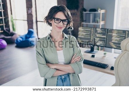 Photo of pretty friendly server optimization specialist crossed arms look camera loft room workplace