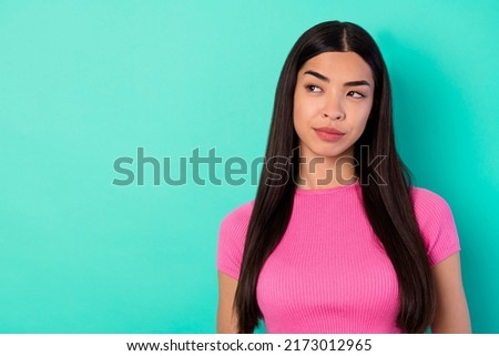 Photo of adorable charming woman look empty space brainstorming tricky plan isolated on teal color background Royalty-Free Stock Photo #2173012965