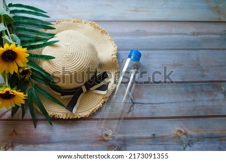 Pictures of straw hats, sunflowers, plants, and plastic bottles