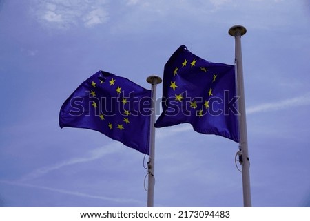 Blue europe two stars european flag of EU floats in summer wind