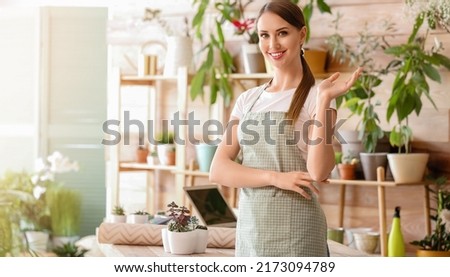 Portrait of female florist in shop