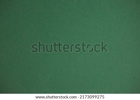 Wooden arrows point on green background. Space for your text