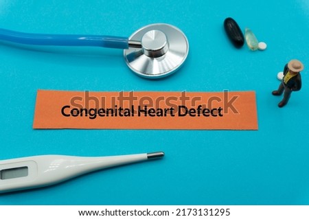 Congenital Heart Defect.The word is written on a slip of colored paper. health terms, health care words, medical terminology. wellness Buzzwords. disease acronyms. Royalty-Free Stock Photo #2173131295