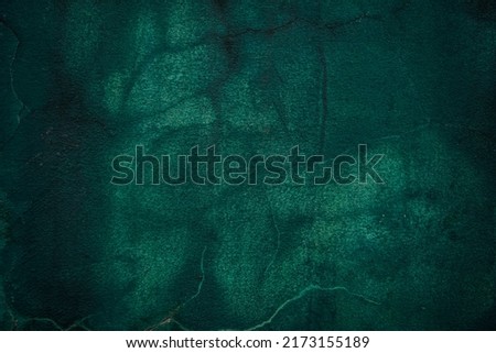Beautiful abstract green old plaster wall. Textured background.