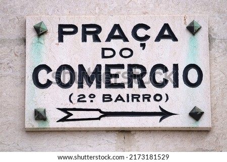 Praca do Comercio landmark square name sign in Lisbon, Portugal.