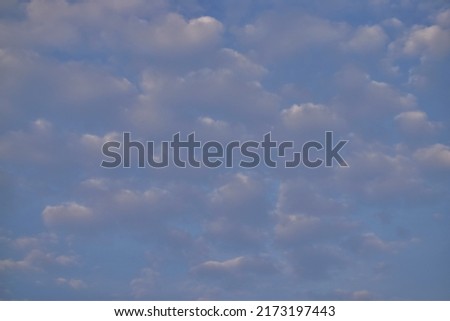 color and texture of clouds in the sky in the afternoon