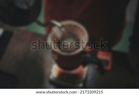 defocused background abstract of coffee brewing with v60 method