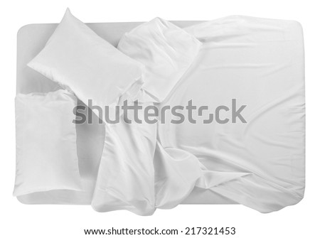 Bed covered with bed spreads and soft pillow. Royalty-Free Stock Photo #217321453