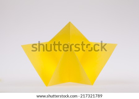 Yellow blank paper on white background.
