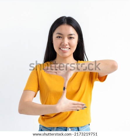 Deaf mute young Asian woman on white background Royalty-Free Stock Photo #2173219751