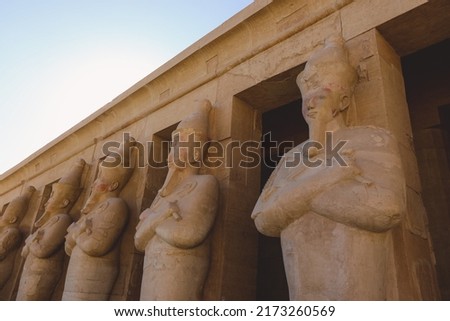 Ancient Egyptian God Statues in the Mortuary Temple of Hatshepsut near Luxor, Egypt