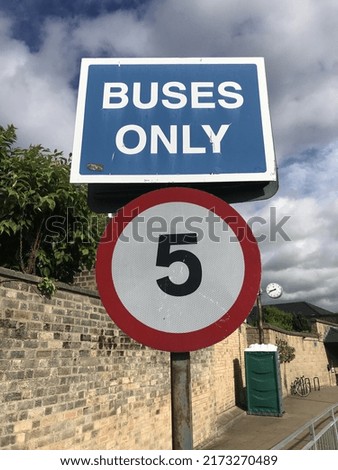 Buses only sign toilet clock