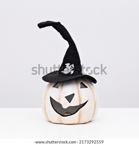 Cartoon Halloween pumpkin with hat for decoration on white. Celebration concept. Party decoration. Happy Halloween