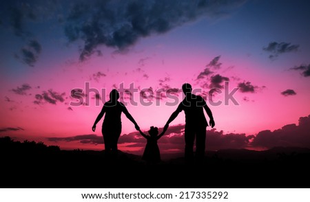 Happy family together hand in hand  Royalty-Free Stock Photo #217335292