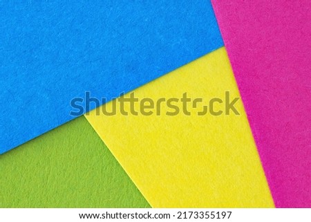 Abstract Photo of Blue, Green, Pink, Yellow Paper Composition. Bright Colorful Background from Paper Sheets.