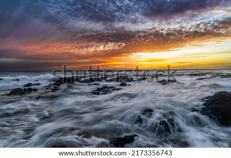 Dawn over the sea horizon. Sea horizon at dawn. Beautiful sunrise over sea horizon. Sea horizon at dawn landscape Royalty-Free Stock Photo #2173356743