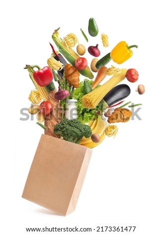 Paper bag with products on a white 