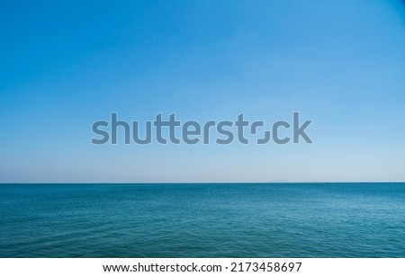 Panorama front view landscape Blue sea and sky blue background morning day look calm summer Nature tropical sea Beautiful  ocen water travel Bangsaen Beach East thailand Chonburi Exotic horizon. Royalty-Free Stock Photo #2173458697