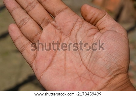 Right hand line, a man's hand.
