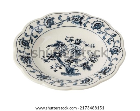 Decorative plates with a circular arabic blue pattern, 45 degree angle. White background. Isolated Royalty-Free Stock Photo #2173488151