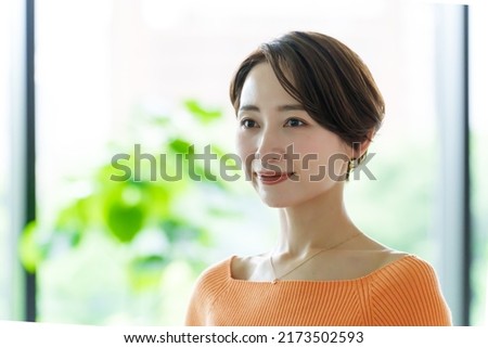 portrait of attractive asian woman with short hair