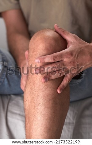 Adult male with knee pain, dislocation, numbness, cramp and other joint issues.