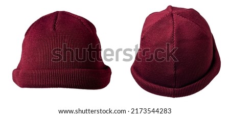 two docker knitted burgundy hats isolated on white background. fashionable rapper hat. hat fisherman Royalty-Free Stock Photo #2173544283