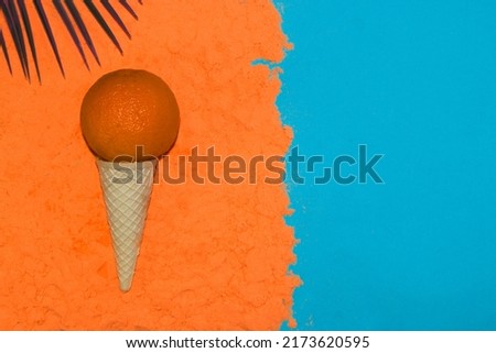 ice cream cone with orange fruit ice cream ball, creative tropical design, exotic concept