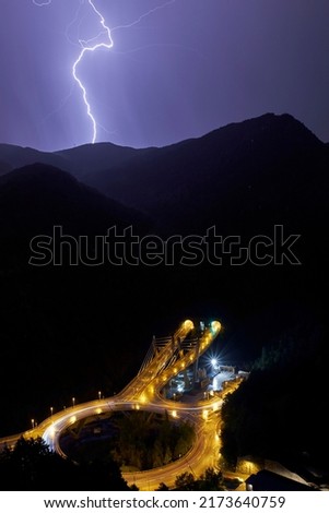 photo of lightning and road