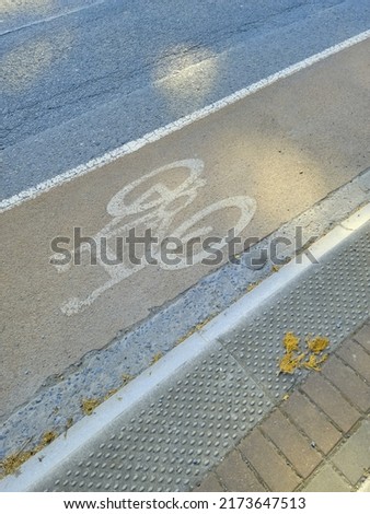 road marking, bike lane, and speed trap