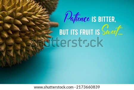 A quote "Patience IS BITTER, BUT ITS FRUIT IS Sweet" with decoration of fresh and exotic durians (with selective focus photo of the durian thorns); on turquoise background. 