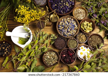 Natural medicine, herbs Royalty-Free Stock Photo #217367860