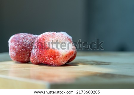 Macro Photograph of Frozen Strawberries