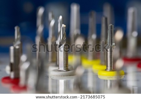 excellent macro dental photo of drills of different lengths for implantation